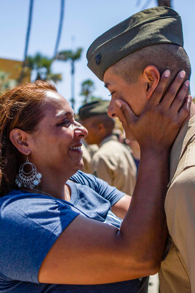A Marine exchanges greetings with a loved one at Marine Corps Recruit Depot San Diego, Aug. 29, 2019, during liberty call, when families got to see new Marines before they graduate.